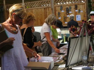 guests browsing cards and checking out Nancy's seahorses